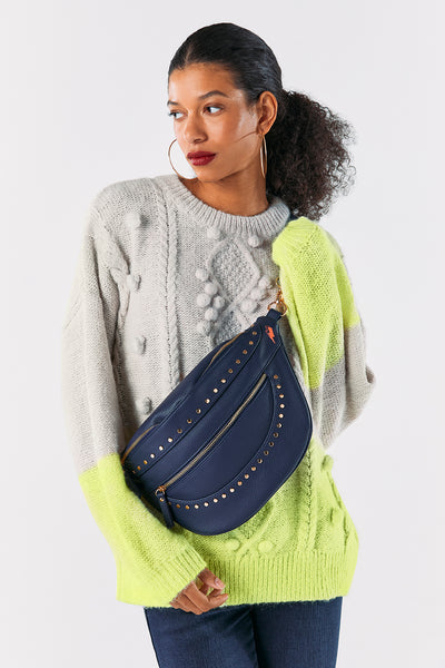 Scamp and Dude Navy Studded Bum Bag | Model wearing knit jumper with navy bum bag around shoulder