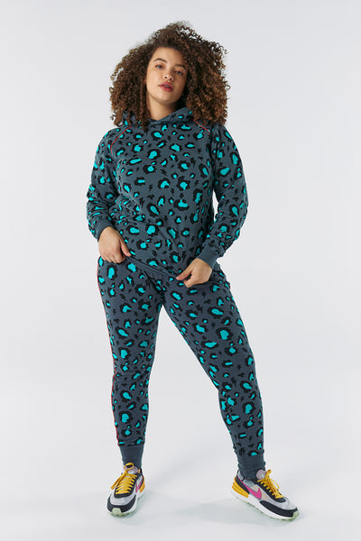 Scamp and Dude Grey and Blue Leopard Print Jumper | Model wearing matching grey and green leopard print jumper and leggings