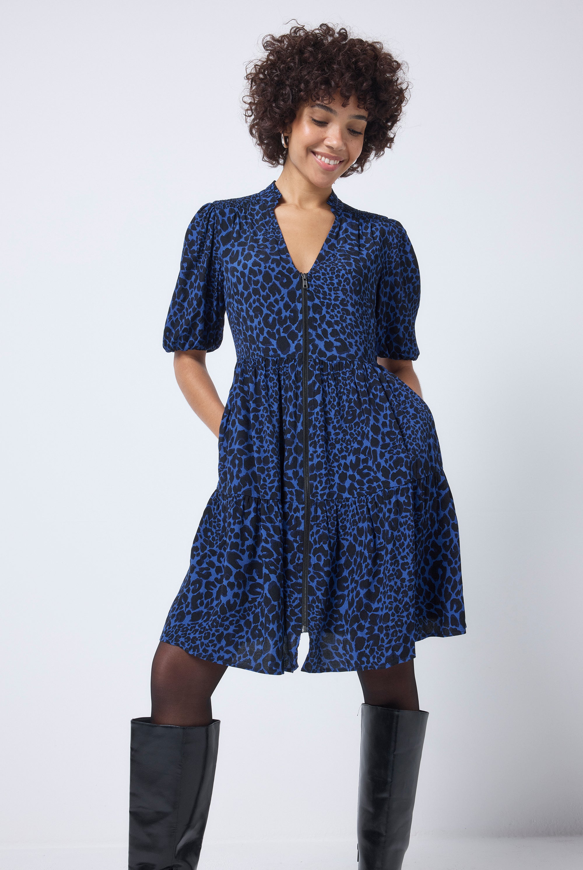Scamp and Dude Navy with Black Rock and Roll Leopard Zip Detail Tiered Short Dress | Model wearing a short navy zip detail dress paired with black tights and knee high boots.