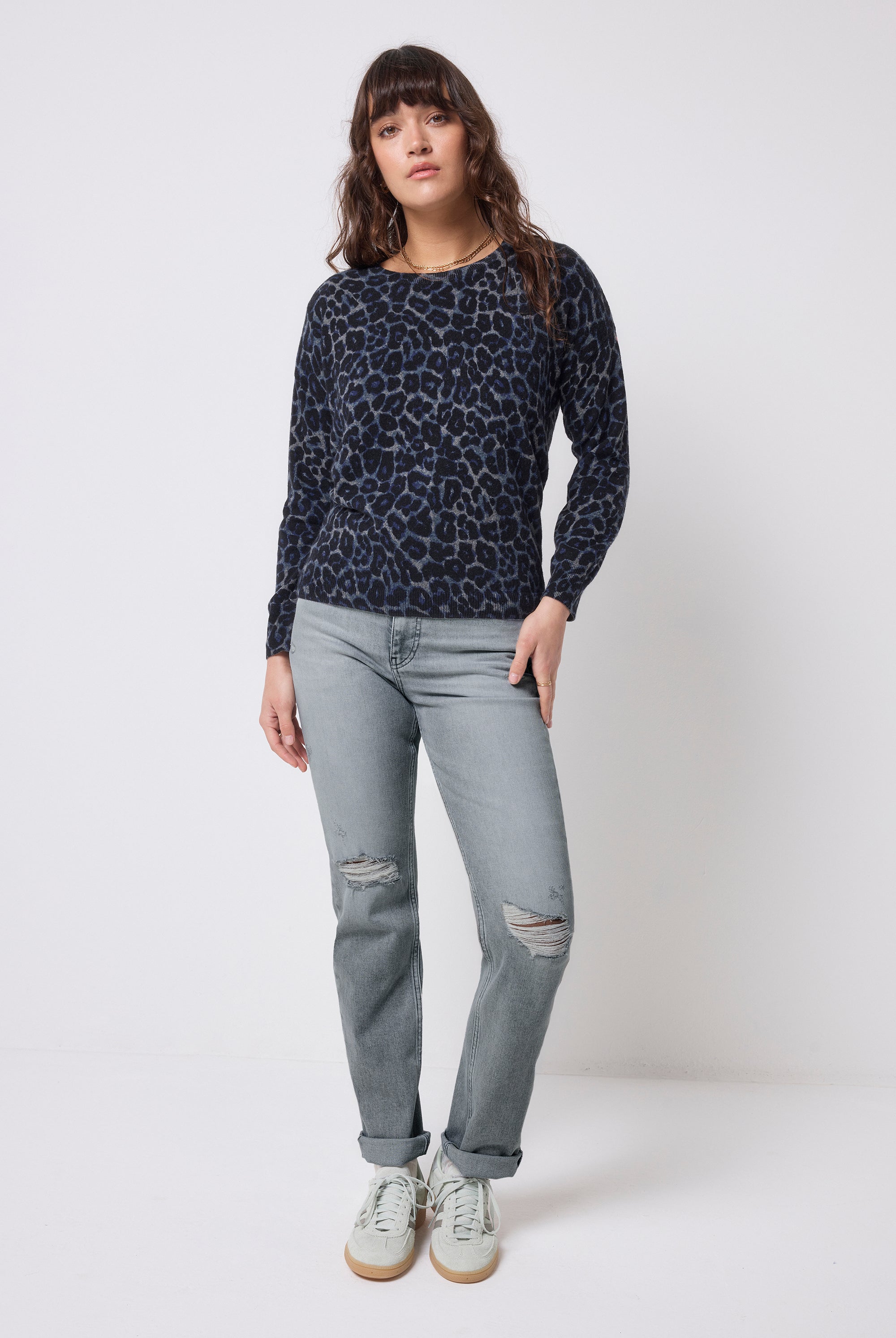 Scamp and Dude Navy Jaguar Printed Knit Jumper | Model wearing a navy printed knit jumper with a pair of grey washed jeans.