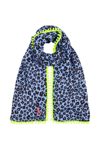 A soft blue with black floral leopard and lightning bolt print scarf with a neon yellow pom pom trim