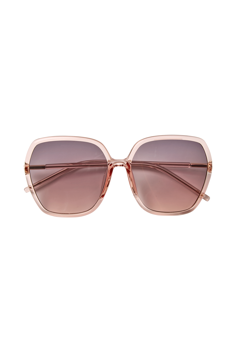 Blush pink oversized '70s style sunglasses with smoke to pink gradient lenses