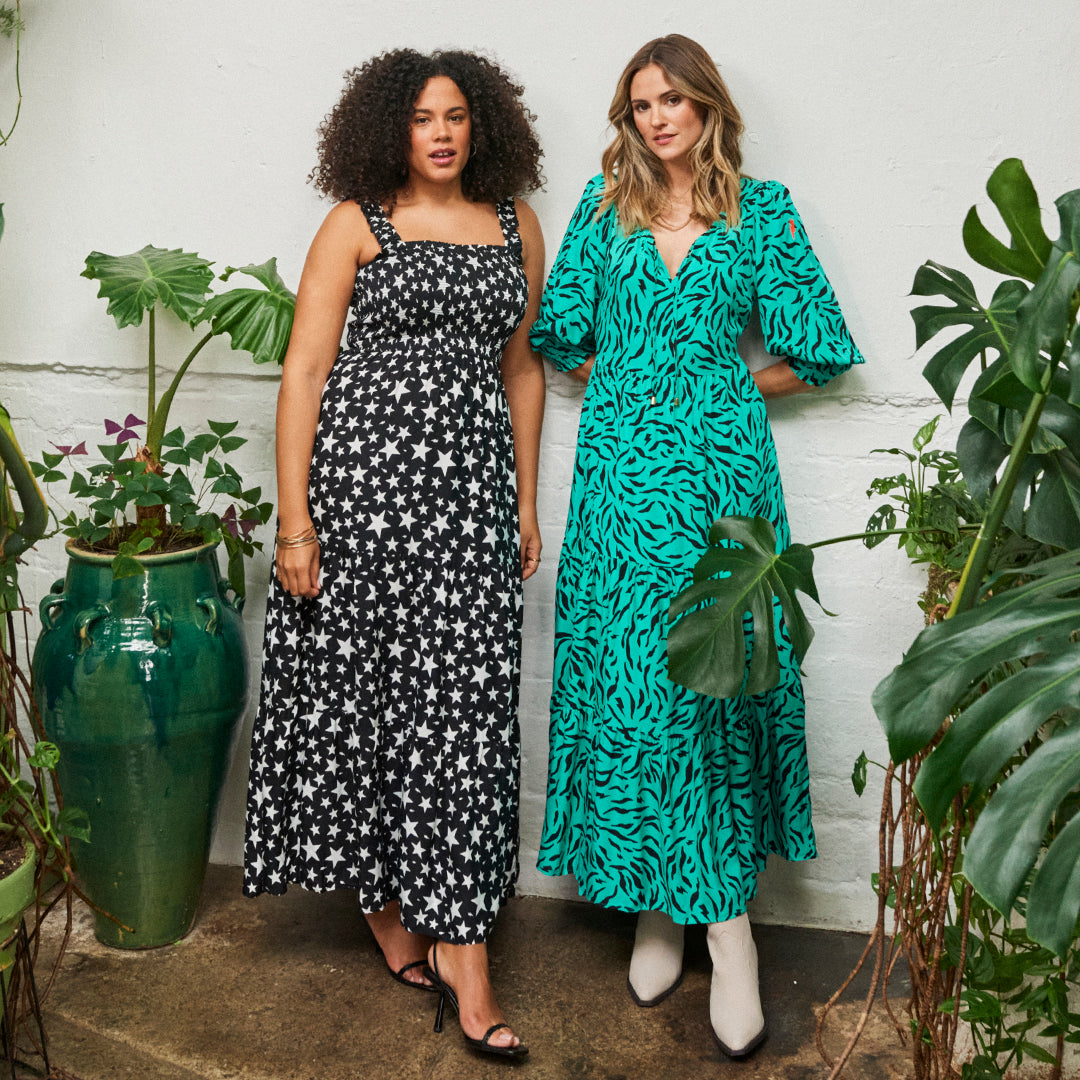 Two women wearing Scamp & Dude maxi dresses from the Brighter Days collection