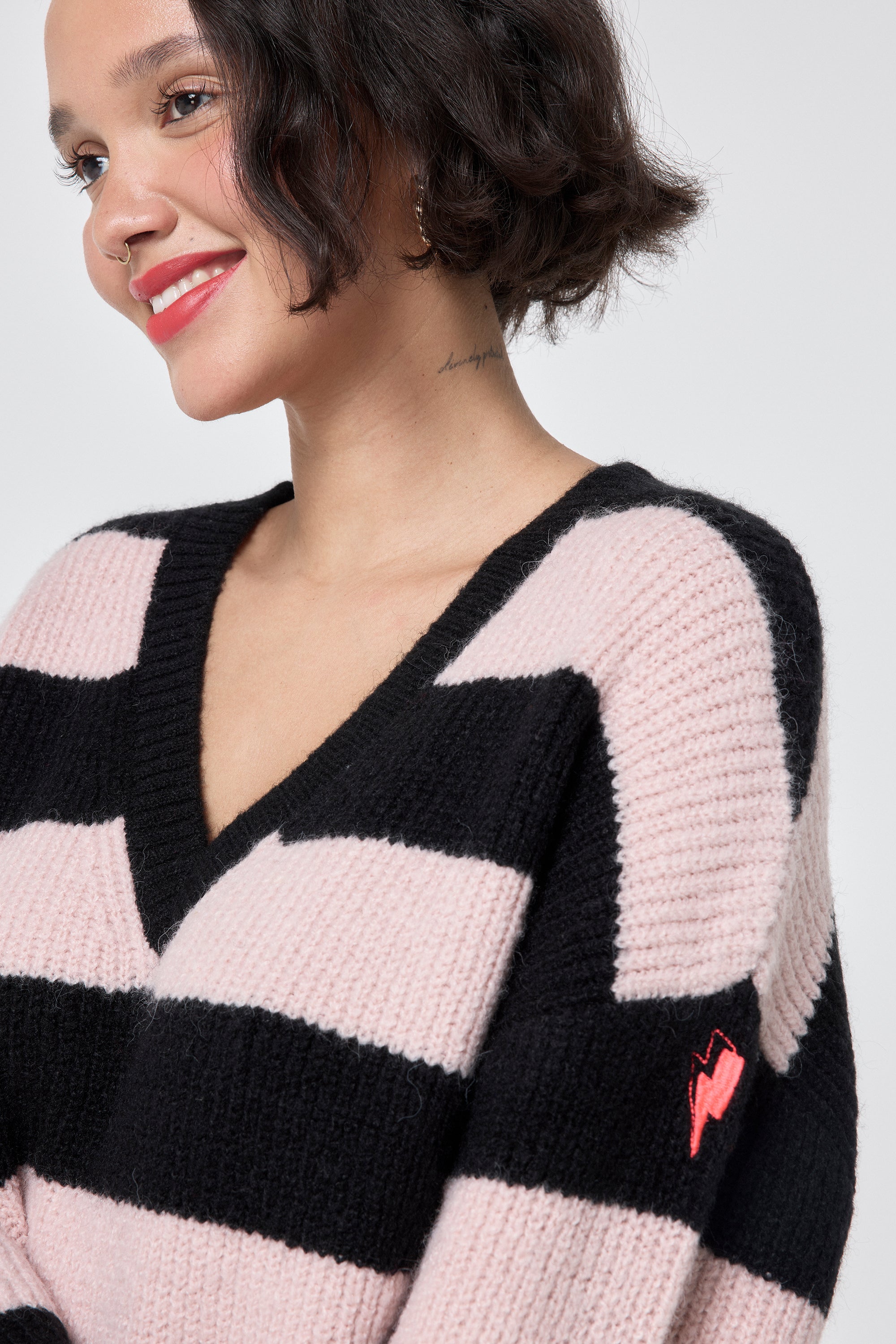 Pink black jumper hotsell