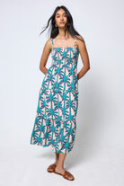 Scamp & Dude Cream with Green Shadow Palm Bandeau Midi Dress | Model wearing a palm tree patterned bandeau midi dress.