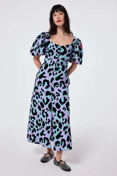 Scamp and Dude Lilac and Green with Black Mega Leopard Sweetheart Puff Sleeve Tea Dress | Model wearing lilac and green with black mega leopard sweetheart neckline midi tea dress with puff sleeve detail and button through placket.