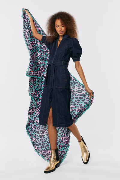 Scamp and Dude Rinse Wash Zip Detail Denim Dress | Model wearing denim dress and gold boots holding a pink and green leopard print scarf