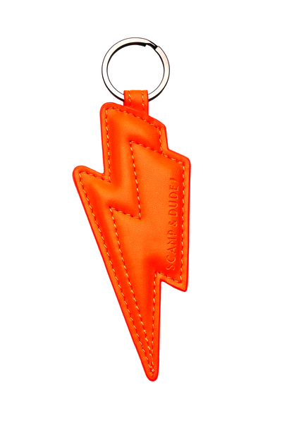 Scamp and Dude Neon Orange Lightning Bolt Keyring | Product image of orange lightning bolt keyring on white background