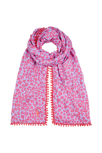 A soft blue with coral floral leopard and lightning bolt print scarf with a coral pom pom trim 
