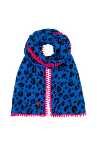 A blue with black leopard & lightning bolt print scarf with a neon pink pom pom trim and neon pink embroidered lightning bolt