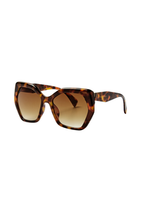 Tortoiseshell oversized sunglasses with gradient brown lenses and Scamp & Dude text & lightning bolt logo on the arm in gold