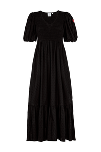 A black v-neck shirred dobby maxi dress with shirring detail across the bust and puff sleeves