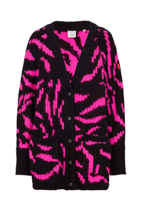 A pink with black zebra chunky knitted cardigan with Scamp & Dude branded buttons and pockets