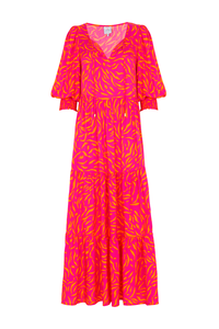 A pink with orange zebra and lightning bolt print tie front tiered maxi dress with 3/4 blouson sleeves 