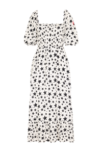 An ivory with black star and lightning bolt print shirred midi dress with blouson sleeves