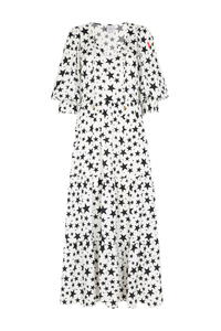 An ivory with black star and lightning bolt print tie front tiered maxi dress with 3/4 blouson sleeves